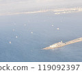 The coastline seen from above, shrouded in white mist 119092397