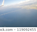 A bridge and the coast photographed from above, shrouded in white mist 119092455