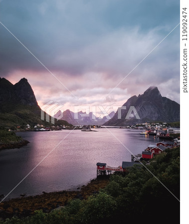 A Serene Mountainous Landscape Showcasing Stunning Reflections at Beautiful Dusk Hours in Norway 119092474