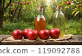 Cider apples on wooden tables on nature backgrounds 119092788