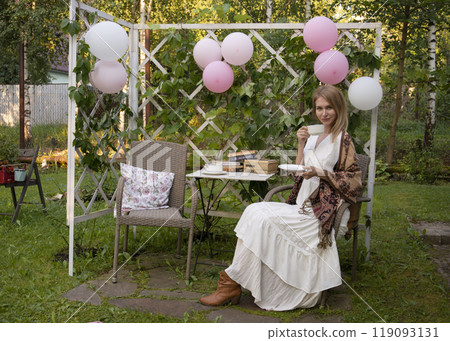 A married couple in boho-style images at a picnic. A married couple in boho-style images at a picnic. 119093131