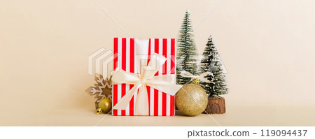 Christmas composition. craft Gift box, small tree, branches and craft DIY decorations on white background. New year concept. Christmas home decoration Flat lay, top view, copy space 119094437