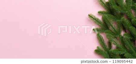 Christmas holiday background with copy space for advertising text. Fir branches on color background . Flat lay, top view 119095442