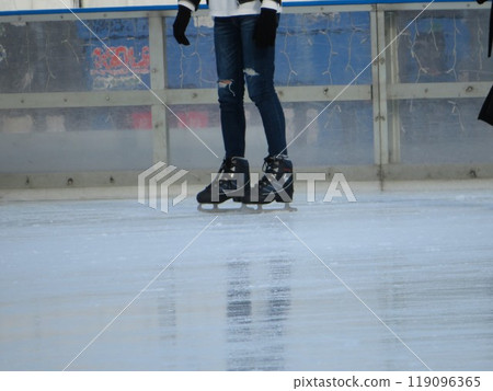 person skating on ice 119096365