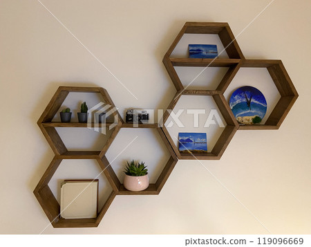 Hexagonal wooden house interior for house walls. Honeycomb shelves for interior home 119096669