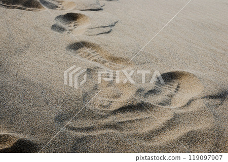 Footprints of the sandy beach Footprints of the sandy beach 119097907