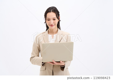 Business woman using a laptop Business woman using a laptop 119098423