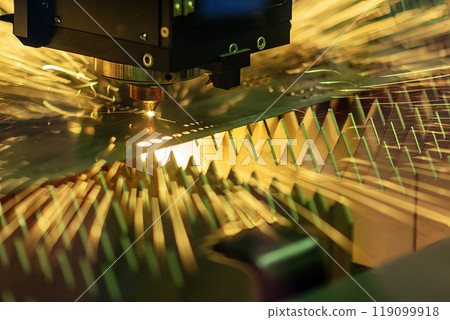 The fiber laser cutting machine cut the metal plate with the sparkling light. The fiber laser cutting machine cut the metal plate with the sparkling light. 119099918