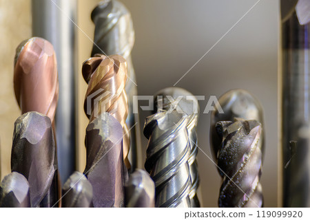 Close-up scene the group of used   cutter end mill tools. 119099920