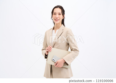 Businesswoman with laptop and smartphone Businesswoman with laptop and smartphone 119100006