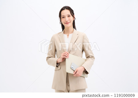 Businesswoman with laptop and smartphone Businesswoman with laptop and smartphone 119100009