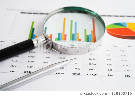 Magnifying glass on charts graphs paper. Financial development, Banking Account, Statistic, Investment Analytic research data economy. 119100719