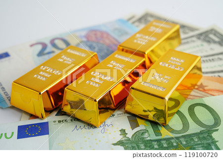 Gold bars with US dollar and Euro banknote money, finance trading investment business currency. 119100720