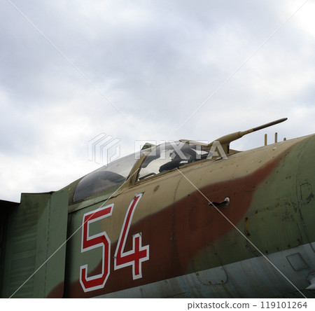 Plexiglas cabin of a military jet fighter with a directional antenna detailed stock photo Plexiglas cabin of a military jet fighter with a directional antenna detailed stock photo 119101264