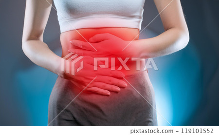 Abdominal pain, stomach ache, woman holding her abdomen 119101552