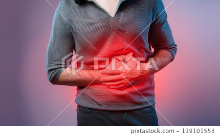 Abdominal pain, stomach ache, man holding his abdomen 119101553