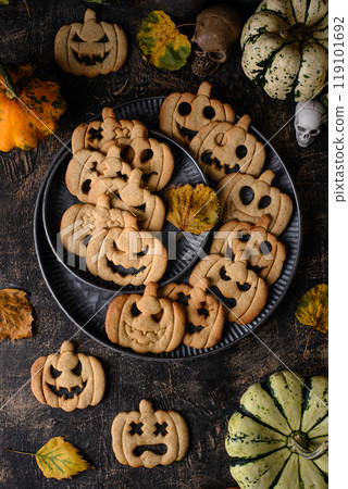 Halloween cookies in shape of jack-o-lantern 119101692