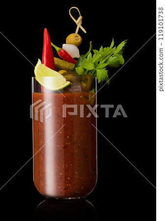 Hot pepper bloody mary mix cocktail with olive,celery on black background with lime slice 119101738