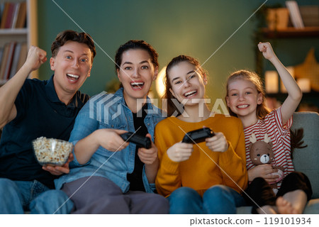 family playing video games family playing video games 119101934