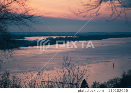 Sunset over Elbe River in Hamburg in winter 119102626