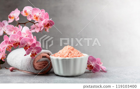 Beautiful blooming orchid flowers and pink sea salt. 119103400