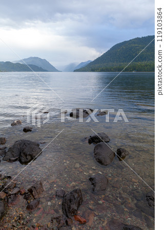 Siberian landscape with stones at the Teletskoye lake coast. Altai Republic, Russia 119103864