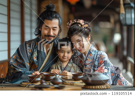 A family performing a traditional tea ceremony. 119105514