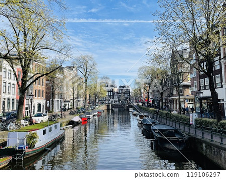 Traditional boats and canals in Amsterdam, Netherlands, Europe Traditional boats and canals in Amsterdam, Netherlands, Europe 119106297