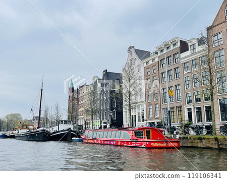 Traditional boats and canals in Amsterdam, Netherlands, Europe Traditional boats and canals in Amsterdam, Netherlands, Europe 119106341