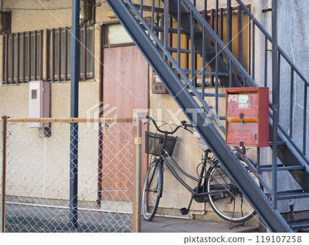 Old apartment (outside stairs, bicycle) Old apartment (outside stairs, bicycle) 119107258