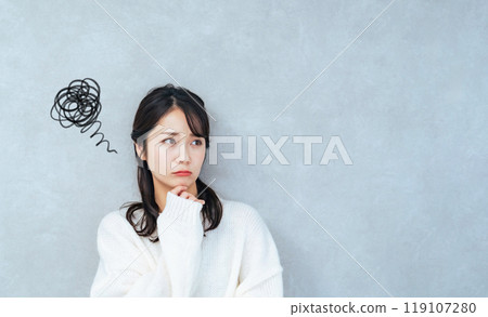 A woman with a troubled look A woman with a troubled look 119107280