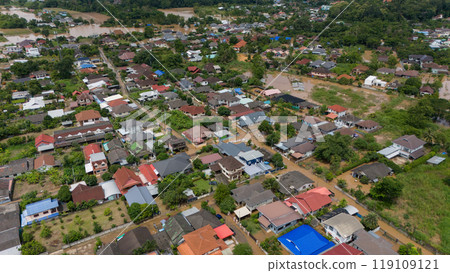 Aerial view of suburb area in Chiang Rai downtown flooding by Kok river after typhoon Yagi has swept Southeast Asia. Aerial view of suburb area in Chiang Rai downtown flooding by Kok river after typhoon Yagi has swept Southeast Asia. 119109121