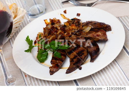 Delicious fried liver pork with fried onion 119109845