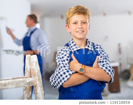 Little helper portrait - son helps father to renovate room Little helper portrait - son helps father to renovate room 119110059