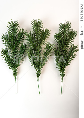Fake fir tree branch for decorating of bouquets and home 119110528