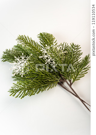 Fake fir tree branch for decorating of bouquets and home 119110534
