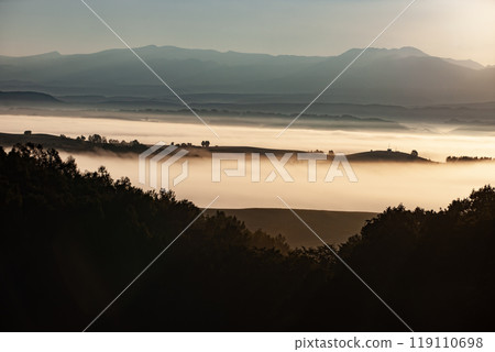Beautiful morning mist on the hills and land Beautiful morning mist on the hills and land 119110698