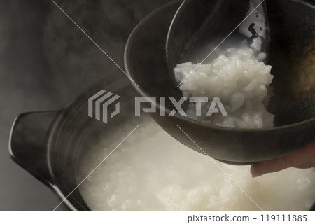 Porridge: Porridge cooked in a clay pot is served in a rice bowl. Porridge: Porridge cooked in a clay pot is served in a rice bowl. 119111885