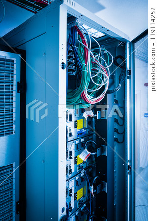 Server room with racks in internet data center 119114252