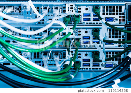 Fiber Optic cables connected to optic ports, network cables conn Fiber Optic cables connected to optic ports, network cables conn 119114268