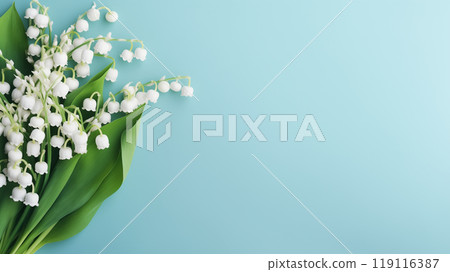 pale blue background with a bouquet of lilies of the valley, free space for text 119116387