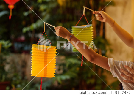 Couple With Chinese Lanterns Outdoors 119117482