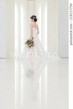 Bride / bride woman with a bouquet at the wedding hall Bride / bride woman with a bouquet at the wedding hall 119117750