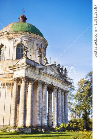 Old church of Exaltation 18th century near Pidhirtsi Castle between trees, Ukraine Old church of Exaltation 18th century near Pidhirtsi Castle between trees, Ukraine 119118567