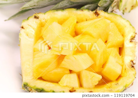 Pineapple basket cut fruit yellow close-up 119119704