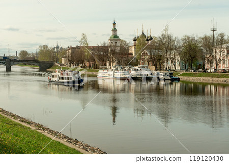 Vologda River embankment lined with low historical buildings and churches 119120430