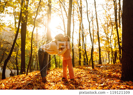 Portrait of happy mother and daughter in autumn forest at sunset. . Autumn women. Portrait of happy mother and daughter in autumn forest at sunset. . Autumn women. 119121109
