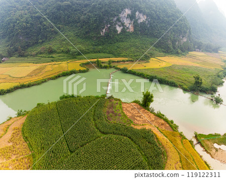 Aerial wide angle view of landscape with rice field at Phong Nam village in Trung Khanh, Cao Bang province,Northern Vietnam Aerial wide angle view of landscape with rice field at Phong Nam village in Trung Khanh, Cao Bang province,Northern Vietnam 119122311