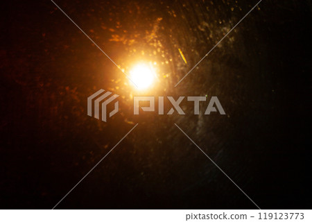 Sun flare on the black background Sun flare on the black background 119123773