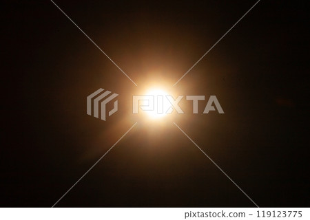 Sun flare on the black background Sun flare on the black background 119123775